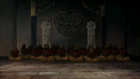 The new masters knelt in front of Hegumen Geetsan, waiting for the signal to reveal their tattoos.