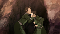 Varrick kissing Bolin on the forehead