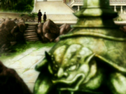 Leon tortuga en estatua.png