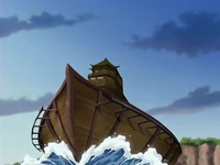 The Fifth Nation ship seen in the distance.