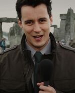 Sam Swainsbury as Stonehenge TV News Reporter