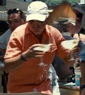 Jimmy Buffett as Running Park Visitor with Margarita Drinks