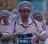 Nikki Gerrard as Nut Factory Worker