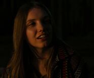 Hannah Murray as Hippie Chick 2