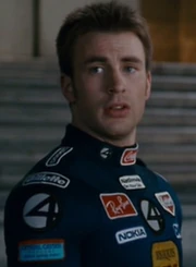 Johnny's mit Werbelogos übersähte Uniform