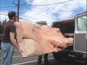 James and other crew members carrying a prop for the AVGN movie