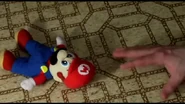 The Nerd tries to use Mario as a weapon.