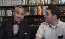 Guest Lloyd Kaufman from Troma sitting next to The Nerd.
