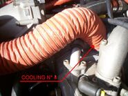 Cylinder 4 scat hose directs airflow to cylinder.