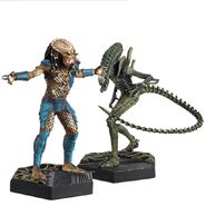 Bonus Edition 3 figurines of a Predator & Xeno Warrior (green tinted) from the 1993 SNES game.