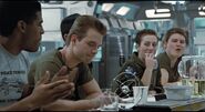 Ferro (2nd from right) eating in the Sulaco's mess hall.