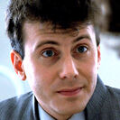 Carter J. Burke (Paul Reiser)