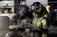 Everybody's friends at the end of the day; Ian Whyte as Wolf alongside Tom Woodruff, Jr. as the Predalien.