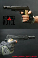 The Royce Hot Toys figure's custom M1911A1. Note the lack of combat hammer and Novak sights seen in the film.