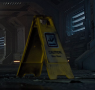 Unique "Slippery when wet" Semiotic Standard symbol from Alien: Romulus (seen on a sign inexplicably still standing despite numerous gravity cycles).