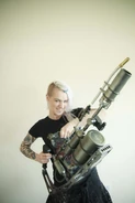 Tarver Productions Ltd painting and finishing employee Tanya Warwick holding a flamethrower used in Prometheus.[4]