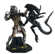 Special Edition 6 figurine of Wolf fighting a Xeno Warrior.