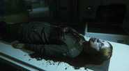 Foster's body, showing the chest wound that killed her — and spelled doom for Sevastopol.