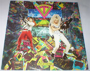 The original cover to Transvision Vamp's 1987 single "Revolution Baby"; the modified "Delta" Pulse Rifle can be made out on the right.