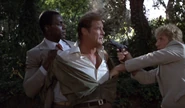 Curtis wrestles with James Bond (Roger Moore) in For Your Eyes Only.