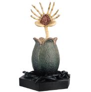 Figurine of a Facehugger leaping out of its egg.