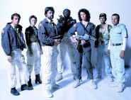 The Nostromo crew. Parker (who never actually uses the weapon in the film) and Dallas are holding RXF-M5 pistols.