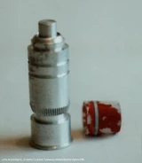 A screen-used grenade given to yourprops.com user "wwwmoviepropsch" as a personal gift from Aliens director James Cameron.[6]