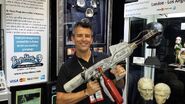 Prop Store CEO and founder Stephen Lane holding Sigourney Weaver's Flame Thrower prop at SDCC 2013.[16]