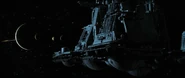 A Tesotek 2100-B refinery being towed by the Nostromo as seen in the film Alien.