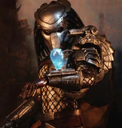 The Crucified Predator with his hologram, displaying Earth.