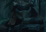 Noland aiming his weapon.