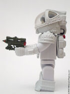 The Kubrick Ripley figure with a laser pistol.