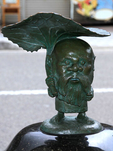 450px-Sakaiminato Mizuki Shigeru Road Koro-pok-guru Statue 1
