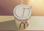 Although Magnetron Hamburger was cut from the anime, a drink with its logo still appears in Episode 19.