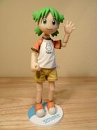 A figure of Yotsuba wearing the T-shirt.