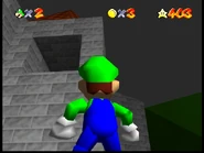 The hole in the tower corresponding to the "black box" on the Super Mario 64 DS start screen image.