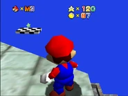 A Green Star on an isolated checker platform.