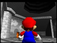 The circular room at the end of the hallway.