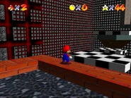 Ultrafort4.png (649 KB) Mario near some unstable checker platforms.