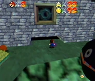 The small hole containing a Wing Cap block.