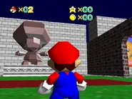 Bowserslobby7.jpg (102 KB) The Toad statue in the hedge maze.