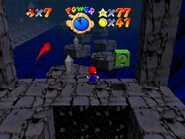 After the wall jump challenge the player can find a road leading up to the Metal Cap Switch.