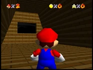 Inaccessible room behind the peach portrait, where the hallway to Polygonal Chaos in Vanilla Lobby would be.