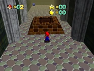 The hole in the back side leading to Bowser in the Dark World (Shoshinkai).