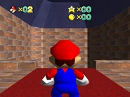 The second room from the left.