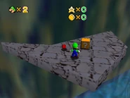 This platform has a box with 10 coins in it, which was changed to a star in later versions