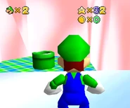 Warp pipe leading to Ghost Slide in a pink and white room.