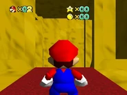 The first room from the right.