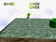 Using the Koopa Shell to easily scale the slope to the right.