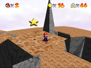 The top of the mountain with a star.